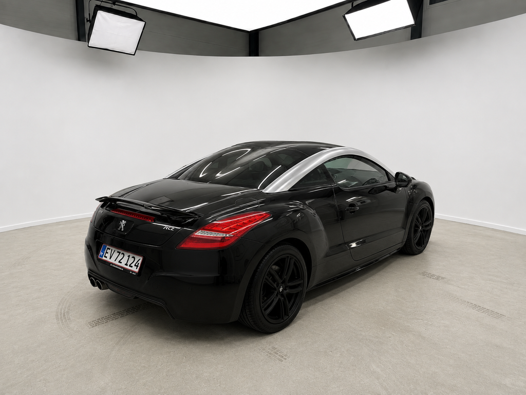 Peugeot RCZ 2011, set skråt bagfra hos ENV Auto i Odense